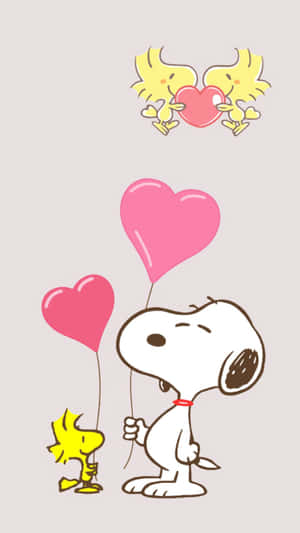 Snoopy And A Bird Holding Balloons Wallpaper