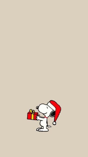 Snoopy Carrying A Present Peanuts Christmas Wallpaper