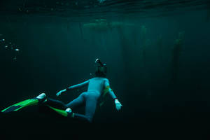 Snorkeling Eerie Waters Wallpaper