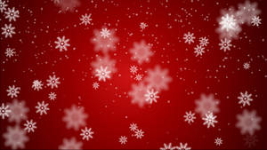 Snowflakes On Red Christmas Background Wallpaper