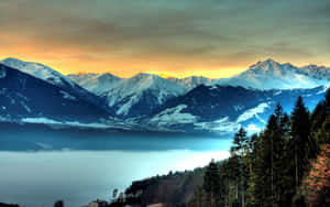 Snowy Mountain Landscape And Foggy Lake Wallpaper