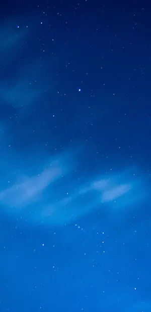 Soar To The Limitless Possibilities Of A Glowing Galaxy Sky Wallpaper