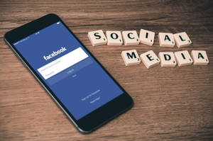 Social Media Facebook On Phone Wallpaper