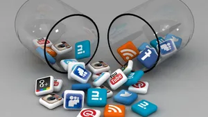 Social Media Icons Spilling Out Of Jar Wallpaper