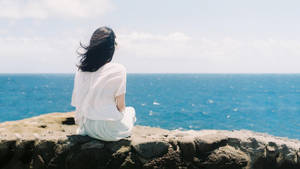 Solitude By The Sea - An Alone Girl Wallpaper