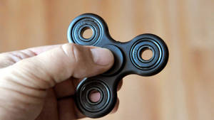 Soothing Black Fidget Toy Wallpaper