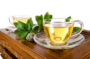 Soothing Cup Of Tea In Clear Glass Wallpaper