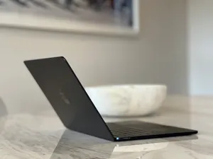 Sophisticated And Stylish Black Macbook Wallpaper