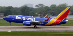 Southwest Aircraft On Vibrant Runway Wallpaper