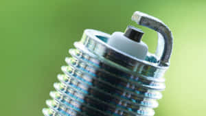 Spark Plug Green Background Wallpaper