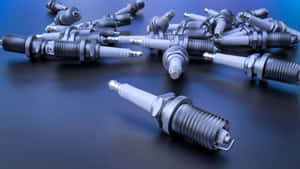 Spark Plug Placed On Ground Wallpaper