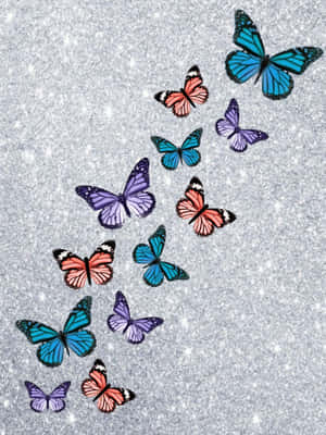 Sparkling Glitter Butterfly Flying Through A Field Of Flowers Wallpaper