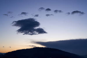 Sparse Dark Blue Clouds Wallpaper