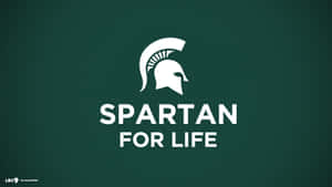 Spartan For Life Logo On A Green Background Wallpaper