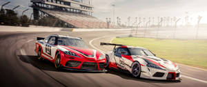 Speed Thrills: A High-resolution Car Racing Snapshot Wallpaper