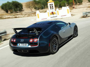 Speeding Black Bugatti Veyron Wallpaper