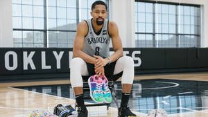 Spencer Dinwiddie With Colorful Sneakers Wallpaper