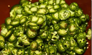 Spicy Sliced Jalapeno Chili Pepper Wallpaper