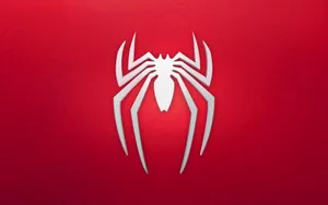 Spider Icon On A Solid Red Wallpaper