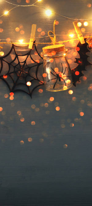 Spider In Bottle Halloween Phone Wallpaper