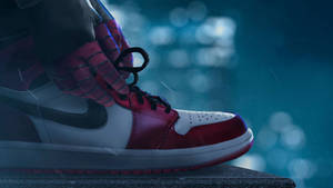 Spiderman Tying His Nike Air Jordan 1 Wallpaper