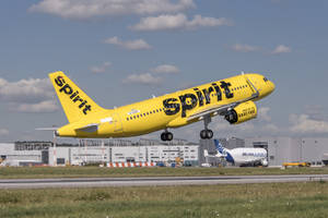 Spirit Airlines Yellow Plane Take Off Wallpaper