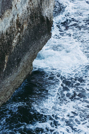 Splashing Water On Rock Malta Wallpaper