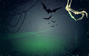 Spooky Halloween Skeleton Grinning In The Shadows Wallpaper