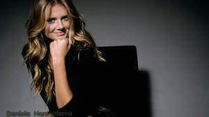 Sports Enthusiast Daniela Hantuchova Posing With A Gleaming Smile Wallpaper