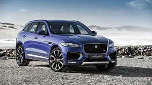 Sporty Outdoors Blue Jaguar Car Wallpaper