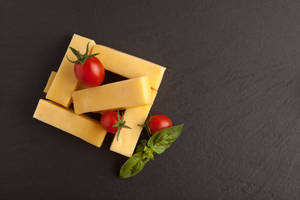 Square Cheese Blocks With Tomatoes Wallpaper