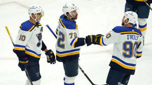 St. Louis Blues Brayden Schenn With Teammates Wallpaper