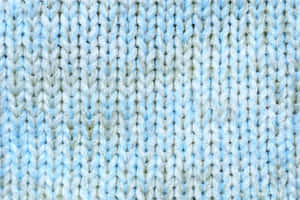 Stained Light Blue Knitting Yarn Wallpaper