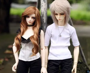 Standing Cute Doll Couple Wallpaper