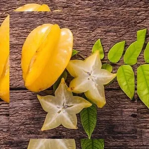 Star Fruit Leaves On The Table Wallpaper