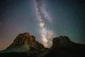 Star Sky With Rock Formation Wallpaper