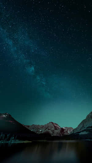 Starry Night Over Mountain Lake Wallpaper