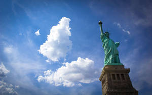 Statue Of Liberty Thick Clouds Wallpaper