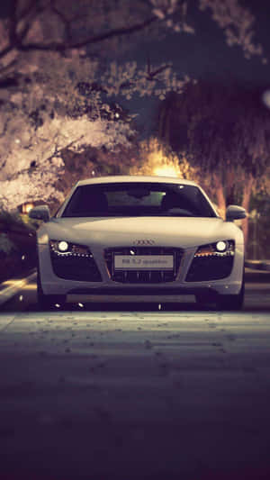 Stay Connected With This Audi Car & Iphone Combo Wallpaper
