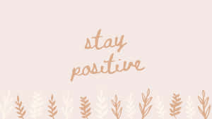 Stay Positive On A Pink Background With A Handwritten Text Wallpaper