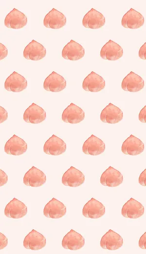 Stay Stylish And Stay Connected With The New Peach Iphone! Wallpaper