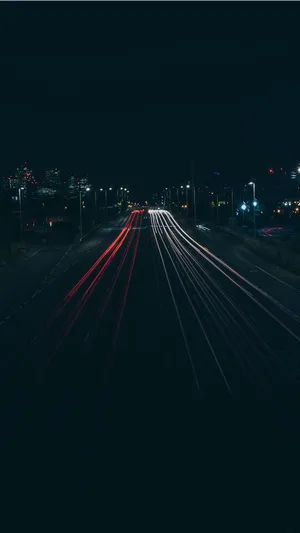 Stellar Night Sky Over Cityscape On Iphone Screen Wallpaper