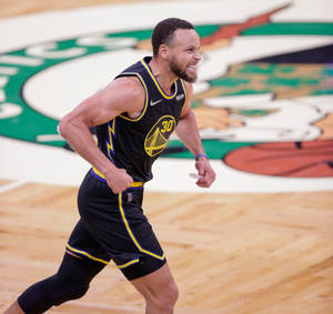 Steph Curry Running While Celebrating Wallpaper