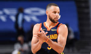 Steph Curry With Hands Together Wallpaper