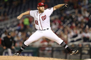 Stephen Strasburg About To Pitch A Ball Wallpaper