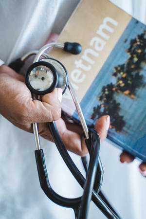 Stethoscope And Book Doctor Motivation Wallpaper