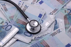 Stethoscope On Top Of Euro Bills Wallpaper