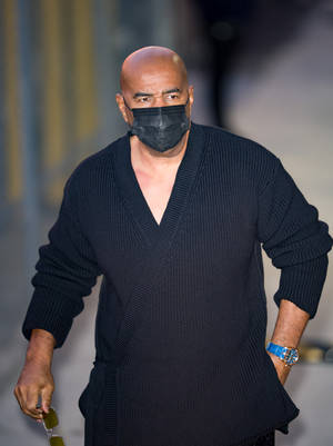 Steve Harvey With A Face Mask Wallpaper