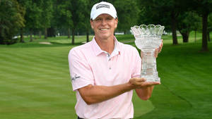 Steve Stricker Holding A Trophy Wallpaper