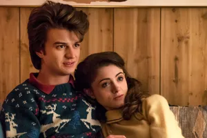 Steveand Nancy Stranger Things Couch Scene Wallpaper